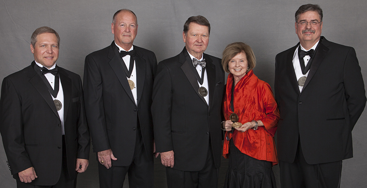 The University of South Alabama National Alumni Association honored five people Thursday evening at the 2015 Distinguished Alumni and Service Awards Dinner held in the Mitchell Center. Accepting the awards, from left, are: Greg Gabel, Distinguished Alumni Award; W. Andrew "Andy" Denny, Distinguished Service Award;  Daniel Grafton, Distinguished Alumni Award; Geri Moulton for the late President Emeritus Gordon Moulton, Moulton Distinguished Service Award; Warren Nicholson, Distinguished Alumni Award. 